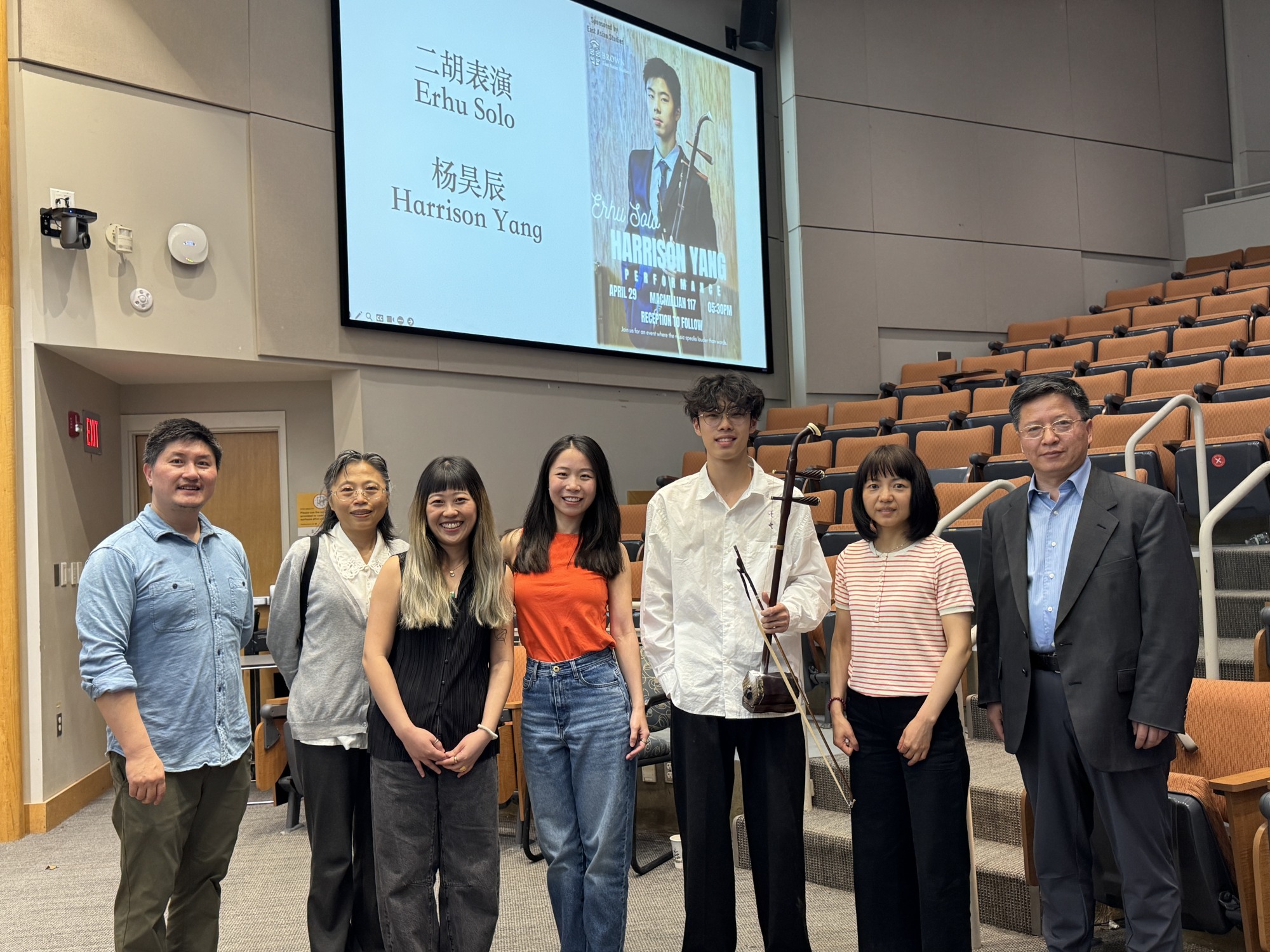 Picture of Chinese Program Faculty with Students holding traditional Chinese musical instruments